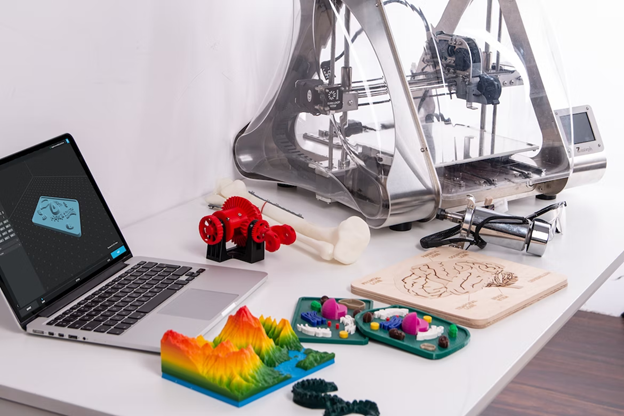 3D Printer alongside some models
