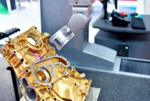 A CMM machine measuring the precision of automobile engine 